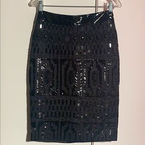 PATENT LEATHER BEADED SKIRT